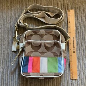 Coach vintage crossbody/shoulder/camera bag. There is a small stain on it.